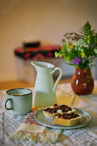 Obraz na płótnie Romanian tradional food background Bread toast with plum jam with milk w salonie