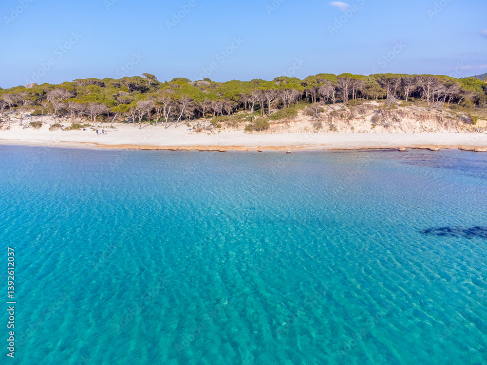 Aerial view of Maria Pia beach under a blue sky.