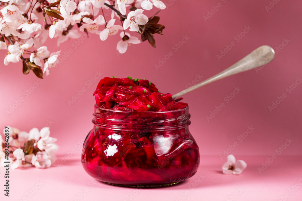 Pickled cabbage with beetroot, rosemary, mustard and other spices, and plum blossoms.