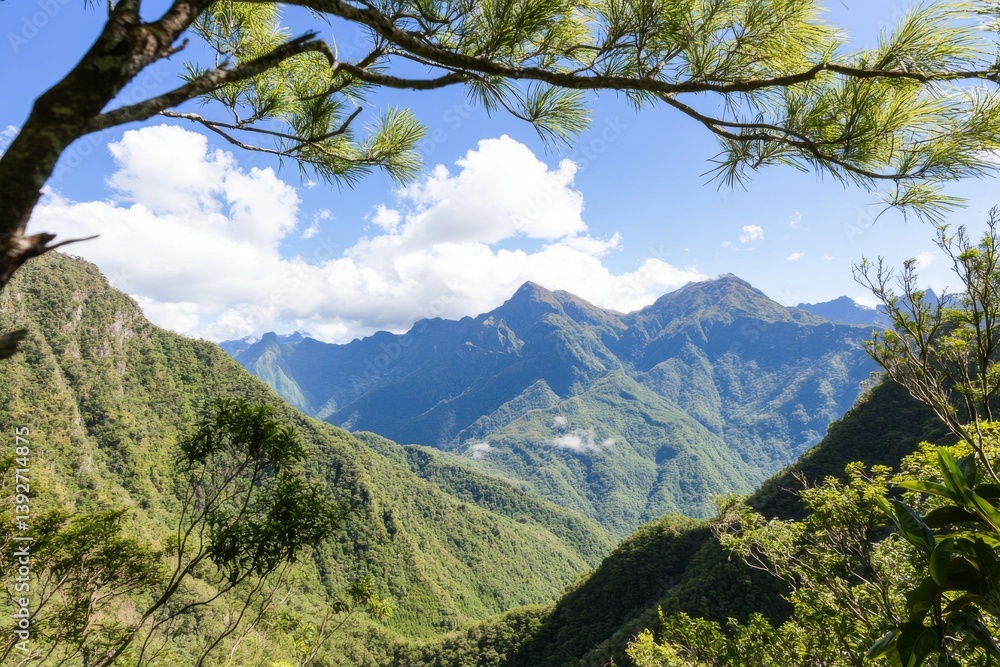 Naklejka premium Mountain range landscape with lush vegetation and clear skies