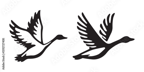 Set of flying goose bird silhouettes isolated on white background