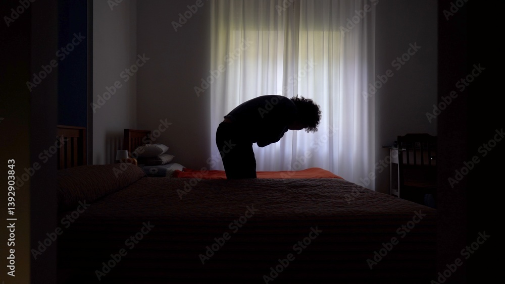 Desperate man in depression at home in bedroom despairs and cries for failure and panic attack and anxiety, loneliness and desperation lifestyle in apartment after economic crisis