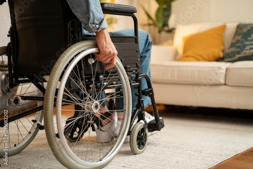 Person In Wheelchair At Home Living Room Achieving Everyday Activities Independently