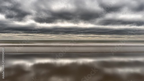 Reflective Seascape Under a Stormy Sky