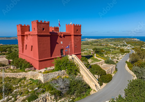 Drone view of famous Red tower on Malta island, Mellieha city