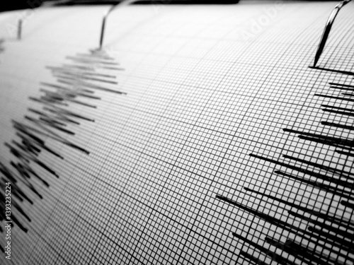 Seismograph and earthquake. A seismograph that records the seismic activity of an earthquake.