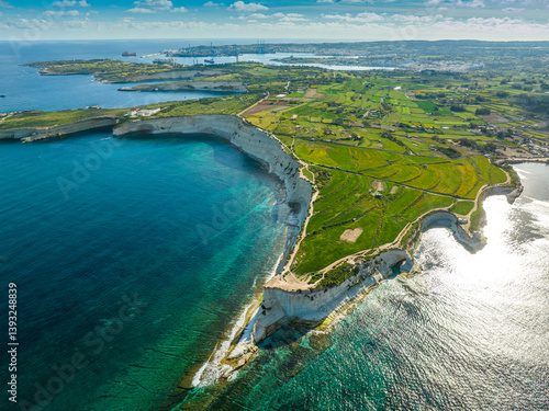 Drone view of south part of Malta island. Green hills, fields, rocks and white cliffs