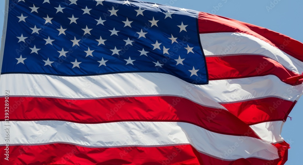 Obraz premium American Flag Waving in the Wind - Patriotic symbol, national pride, freedom, liberty, American heritage. A powerful representing the United States