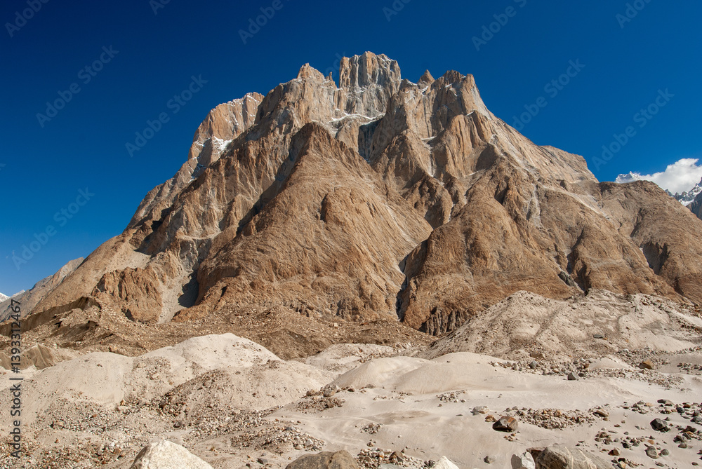 Fototapeta premium Cathedral peak 6247m . Cathedral Peak in the Karakoram range is a rarely climbed peak with low technical difficulty, although it is harder than a trekking peak and has considerable objective danger.