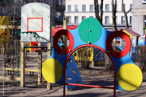 Obraz na płótnie Colorful playground structure with a basketball hoop. w salonie