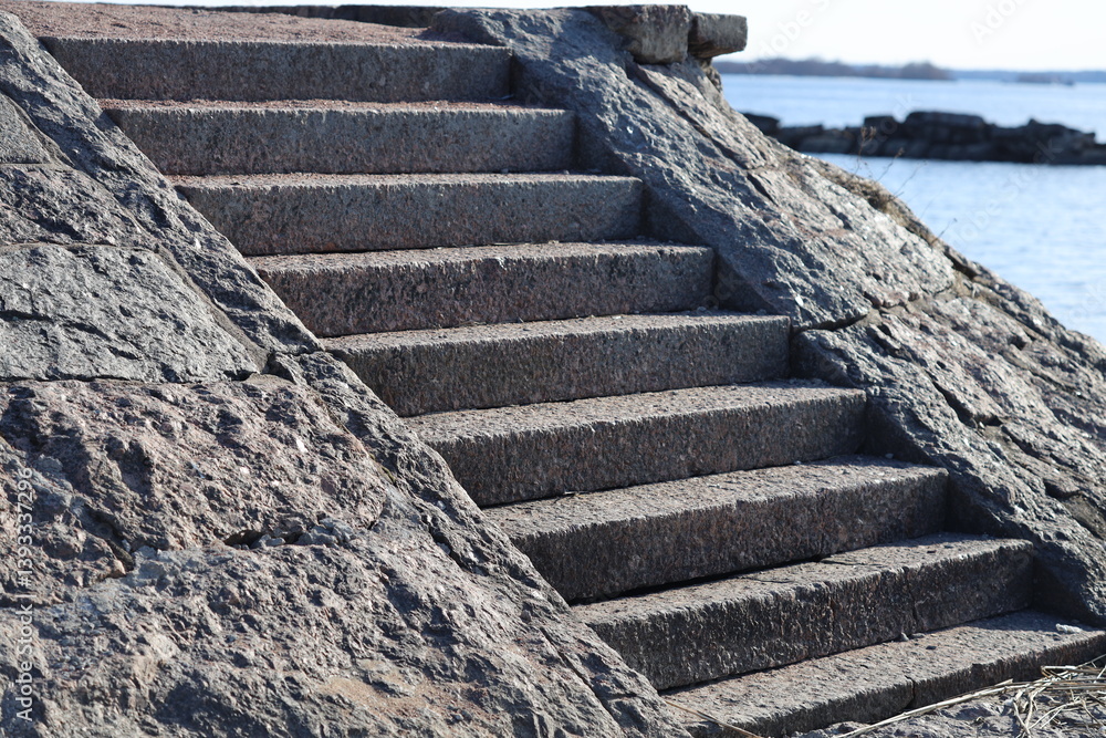 Stairs near a body of water, perfect for travel or outdoor use.