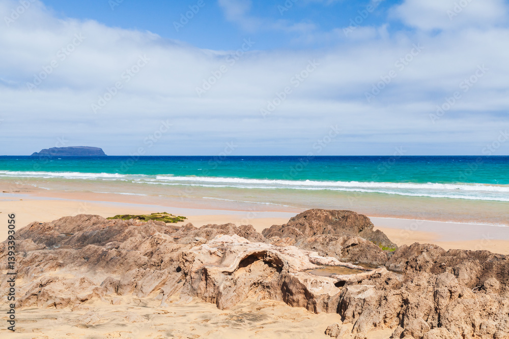 Porto Santo, Portugal. Vibrant ocean beach with pristine aqua blue water