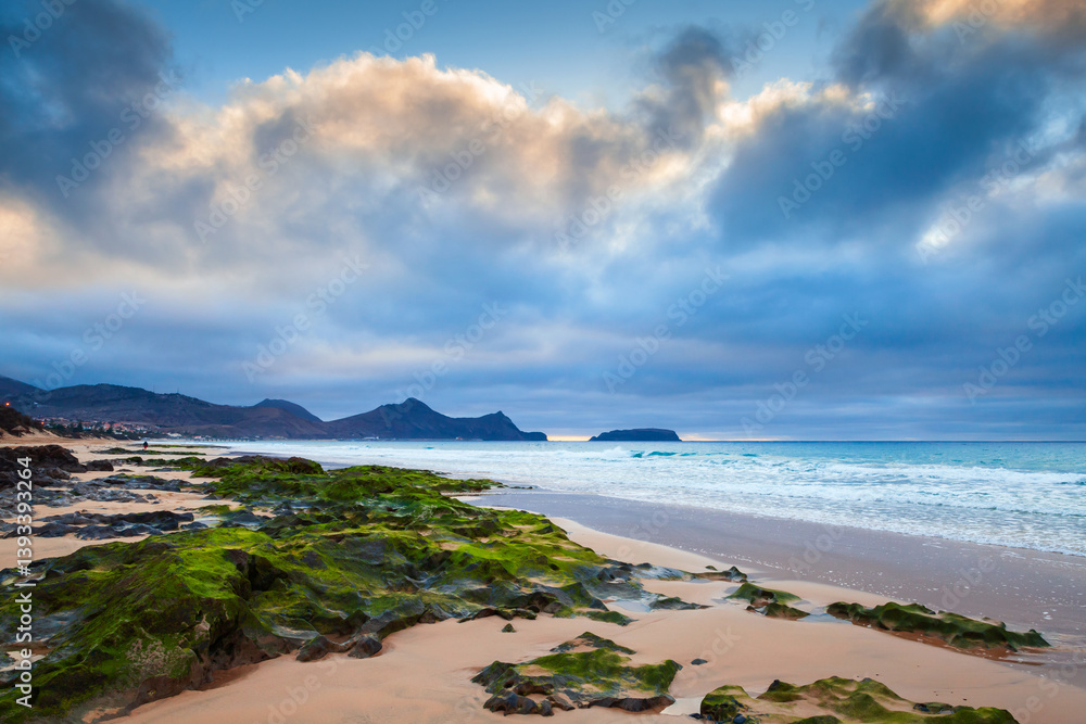 Porto Santo, Portugal. A picturesque beach with algae-covered rocks
