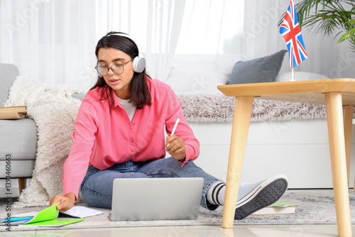 Young woman in headphones l...