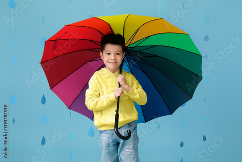 Cute little Asian boy with ...
