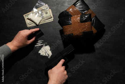 Man with credit card, gun a...