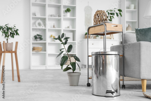 Trash bin near shelf unit i...
