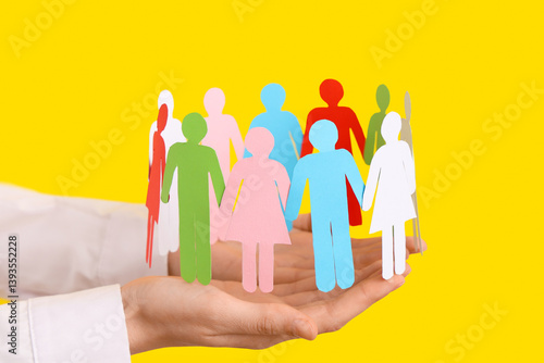 Female hands with paper hum...