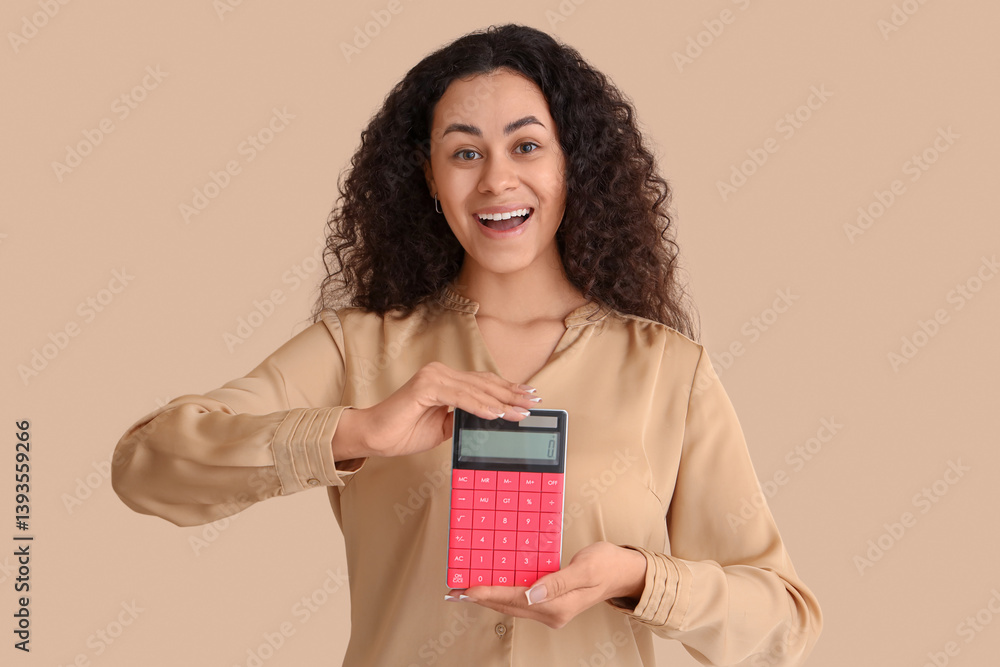 Happy African-American woman with calculator on beige background Happy African-American woman with calculator on beige background