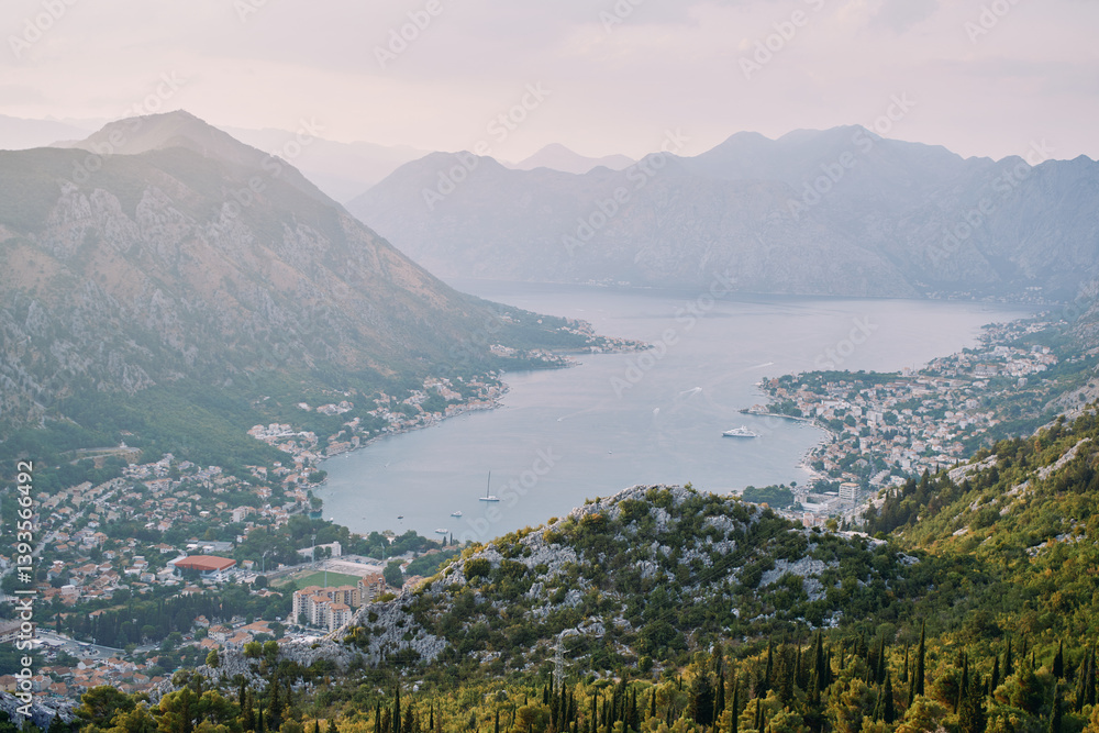 Fototapeta premium View from the mountain to the towns on the shores of the Bay of Kotor. Montenegro