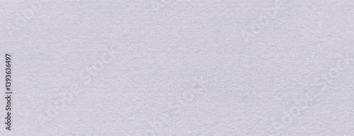 Snow white felt abstract wall fabric background. Surface of fabric texture in white winter color.

