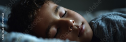 Latin American little boy sleeping in bed. lying asleep in bedroom by night. Panoramic photo (3:1)