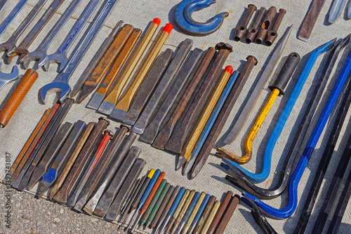 Various sizes of  chisels set metal tools and crowbars