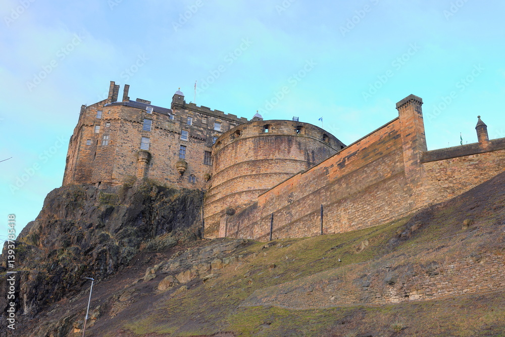 Edinburgh Castle, an 11th-century castle and barracks housing in Edinburgh, Scotland, United Kingdom Edinburgh Castle, an 11th-century castle and barracks housing in Edinburgh, Scotland, United Kingdom