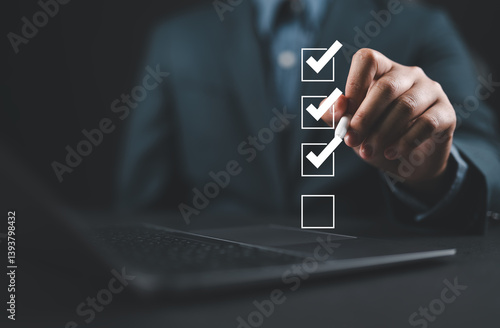 Bild auf Leinwand Businessman use pen to tick correct sign mark in checkbox for quality document control checklist and business approve project concept