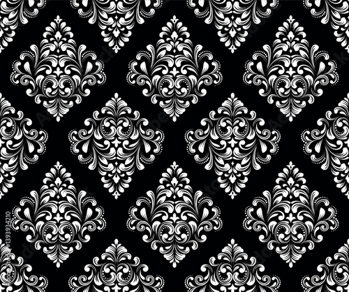 Wallpaper in the style of Baroque. Seamless vector background. White and black floral ornament. Graphic pattern for fabric, wallpaper, packaging. Ornate Damask flower ornament.