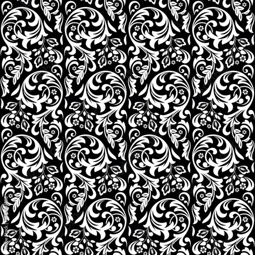 Wallpaper in the style of Baroque. Seamless vector background. White and black floral ornament. Graphic pattern for fabric, wallpaper, packaging. Ornate Damask flower ornament.