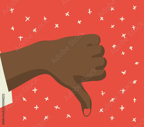 Dark-skinned hand gives thumbs down on red background
