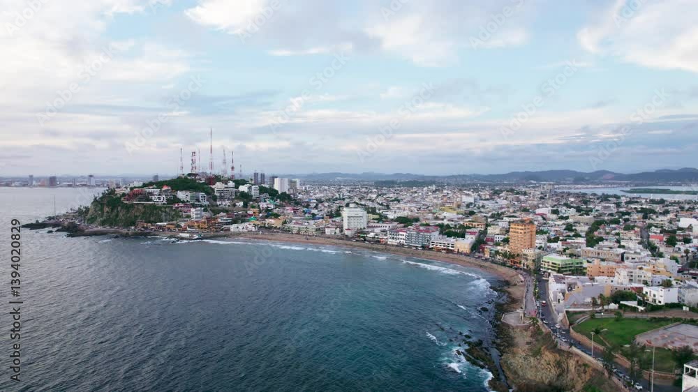 Aerial of Mazatlan coastline with ocean and cityscape on partly cloudy summer day Aerial of Mazatlan coastline with ocean and cityscape on partly cloudy summer day