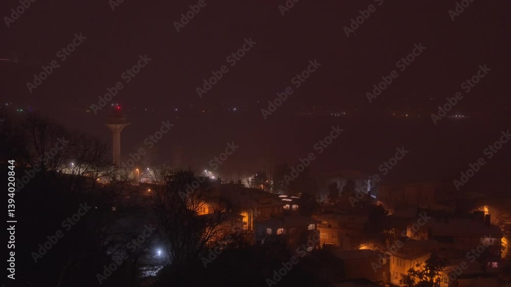 A mesmerizing nighttime view of Istanbul as snow gently falls on rooftops, city lights twinkle, and the Bosphorus glows in the distance. The calm snowfall creates a magical atmosphere over skyline. A mesmerizing nighttime view of Istanbul as snow gently falls on rooftops, city lights twinkle, and the Bosphorus glows in the distance. The calm snowfall creates a magical atmosphere over skyline.