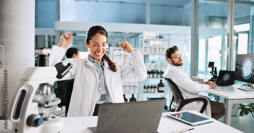 Woman, scientist and celebration with fist pump in lab with medical research, cheers or success. Person, equipment and clinical study for vaccine with goals, dna and laptop for pharmaceutical trial