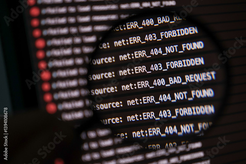 magnified view of http error codes on developer console screen with various 400 403 and 404 status messages indicating access and request issues. soft focus