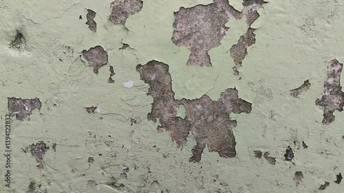 wall paint that is peeling because the wall is damp