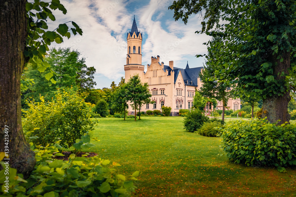 Breathtaking summer view of Kartlow castle. Spectacular morning scene of Kruckow countryside, Germany, Europe. Traveling concept background.