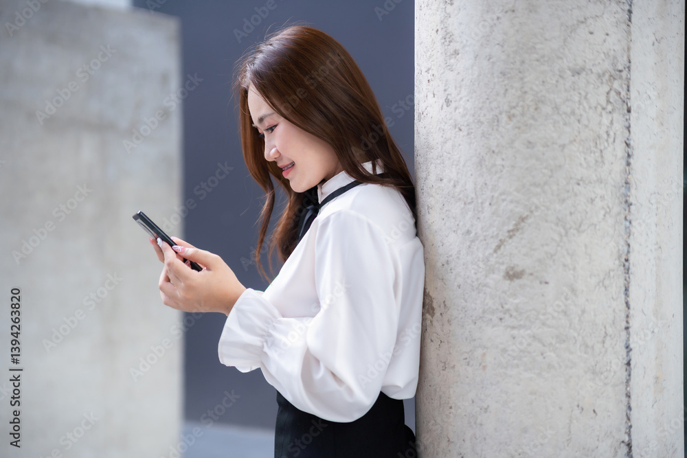 Portrait of beautiful happy Smiling asian woman relaxingread writing message on smartphone using casual working in cafe interior in coffee shop background,Business Lifestyle summer holiday concept