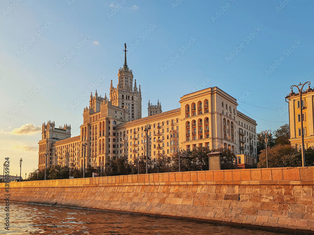 Skyscraper on the Moskva River, golden evening sunset