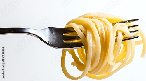 Obraz na płótnie A metal fork holds a delicious portion of cooked pasta w salonie