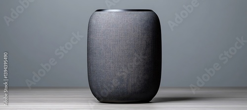 Obraz na płótnie A cylindrical speaker displays a textured fabric covering its outer surface w salonie