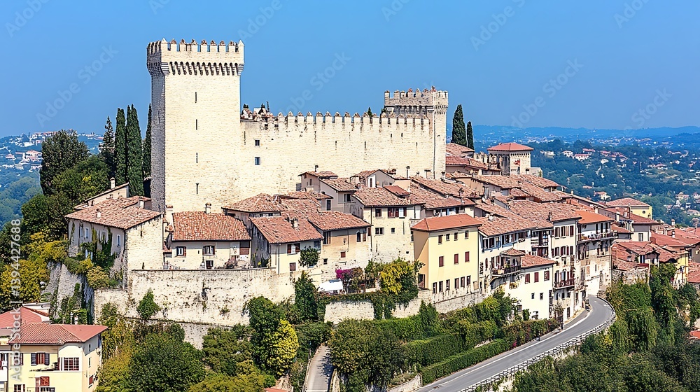 A scenic view of a medieval fortress and surrounding town