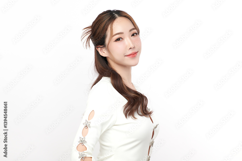 A beautiful young Asian woman with clean, fresh skin against a white background. Skincare, facial treatment, cosmetology, beauty, and spa. An elegant portrait of an Asian woman. A beautiful young Asian woman with clean, fresh skin against a white background. Skincare, facial treatment, cosmetology, beauty, and spa. An elegant portrait of an Asian woman.