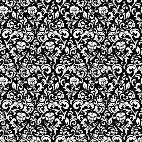 Wallpaper in the style of Baroque. Seamless vector background. White and black floral ornament. Graphic pattern for fabric, wallpaper, packaging. Ornate Damask flower ornament.