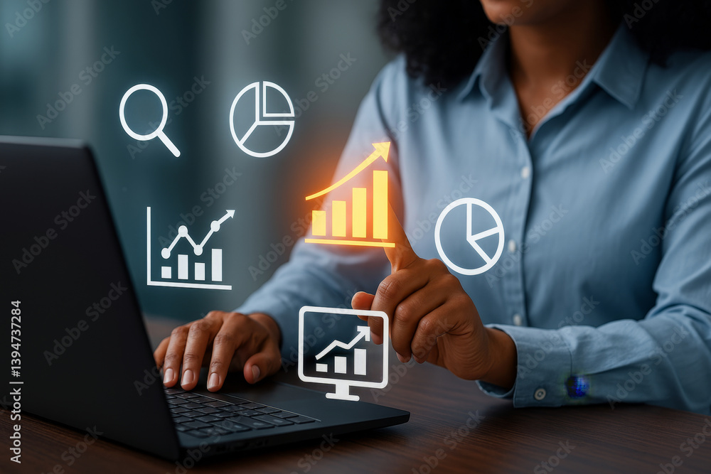 Obraz premium Black woman using laptop and analyzing business analytics with glowing graph interface