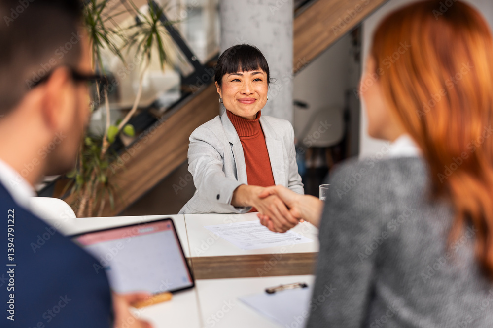 Business Interview in Modern Office Setting with Handshake