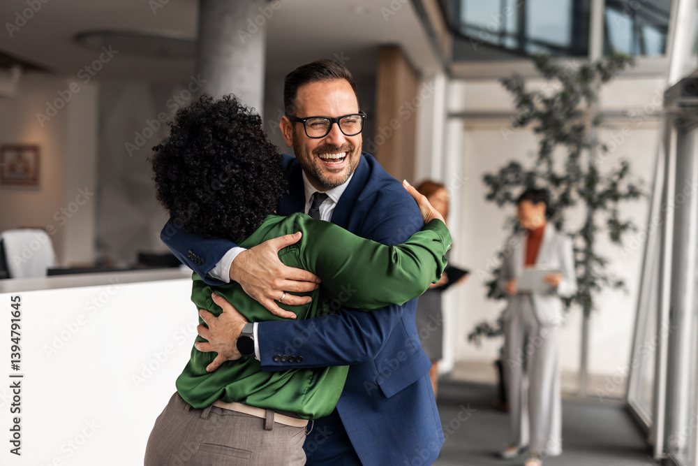 Happy Colleagues Hugging in Modern Corporate Office Environment