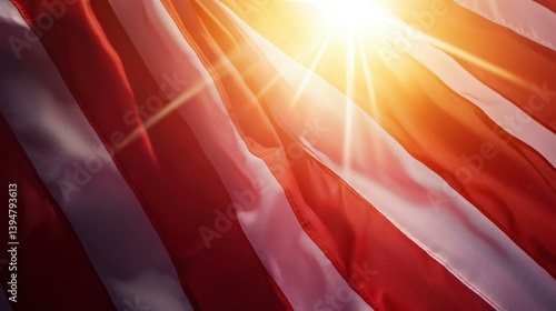Close up of a flag waving in sunlight, red and white stripes, warm light, patriotic feeling