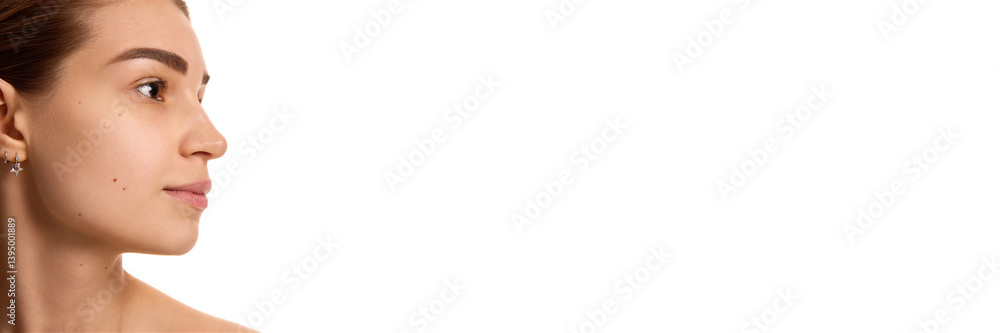 Banner. Side view of young pretty woman with soft, toned facial skin against white background with negative space. No double chin. Concept of youth and natural beauty, lifting, cosmetic, spa. Ad Banner. Side view of young pretty woman with soft, toned facial skin against white background with negative space. No double chin. Concept of youth and natural beauty, lifting, cosmetic, spa. Ad